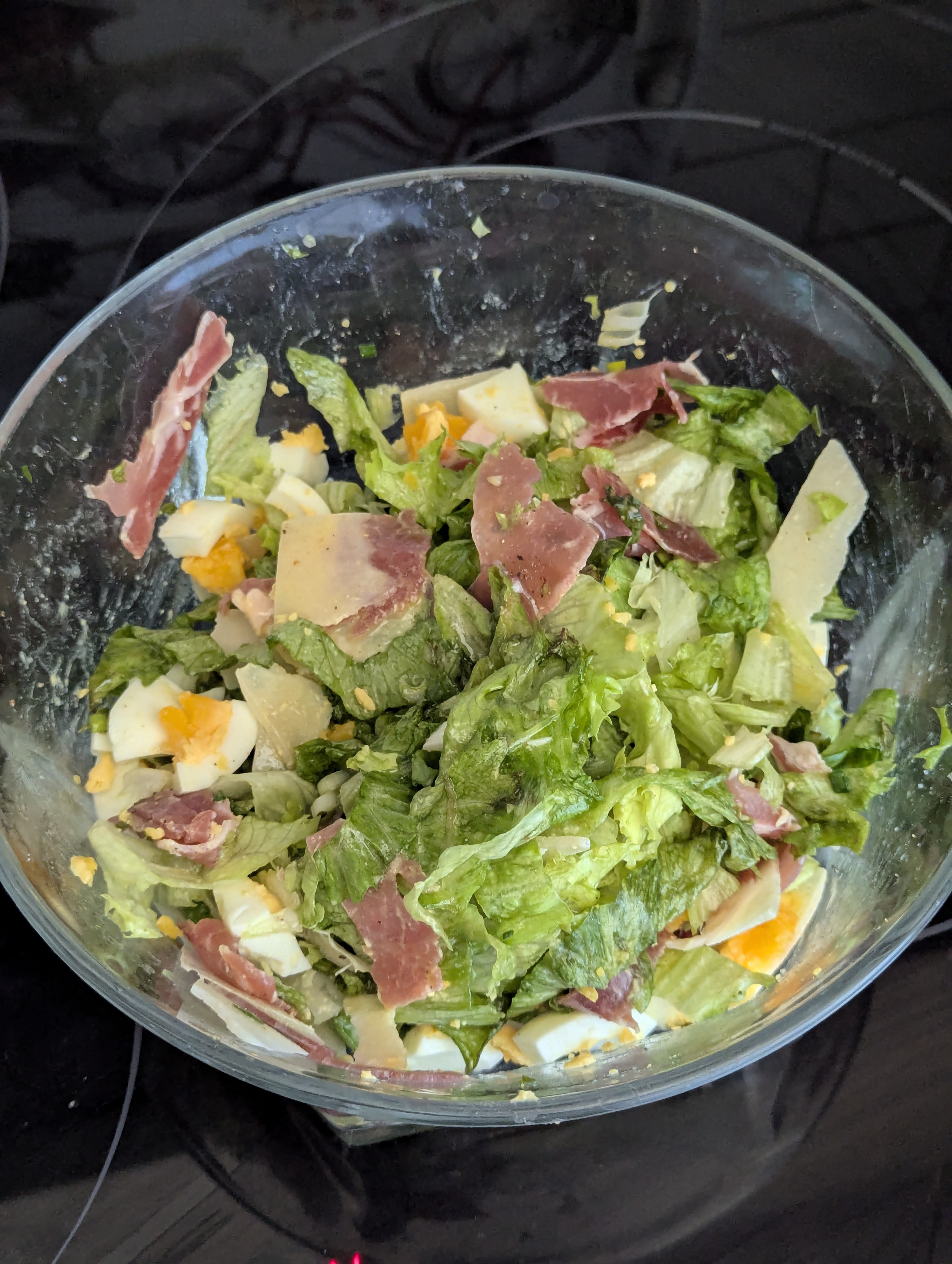 Protein lettuce salad with eggs, pork neck an parmesan 